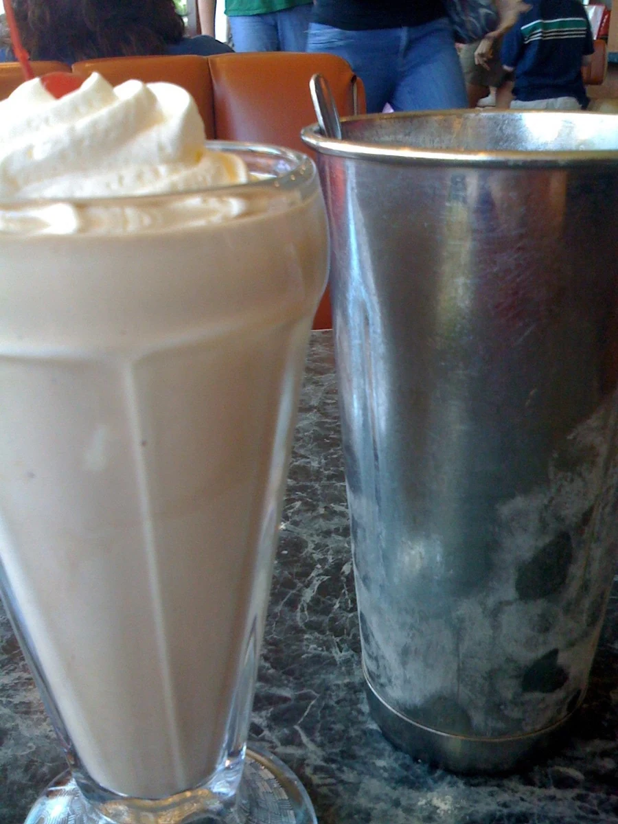 A chocolate milkshake in a glass